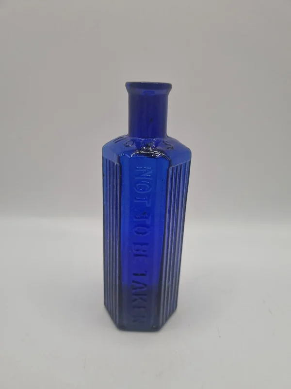 Unique Blue Poison Bottle