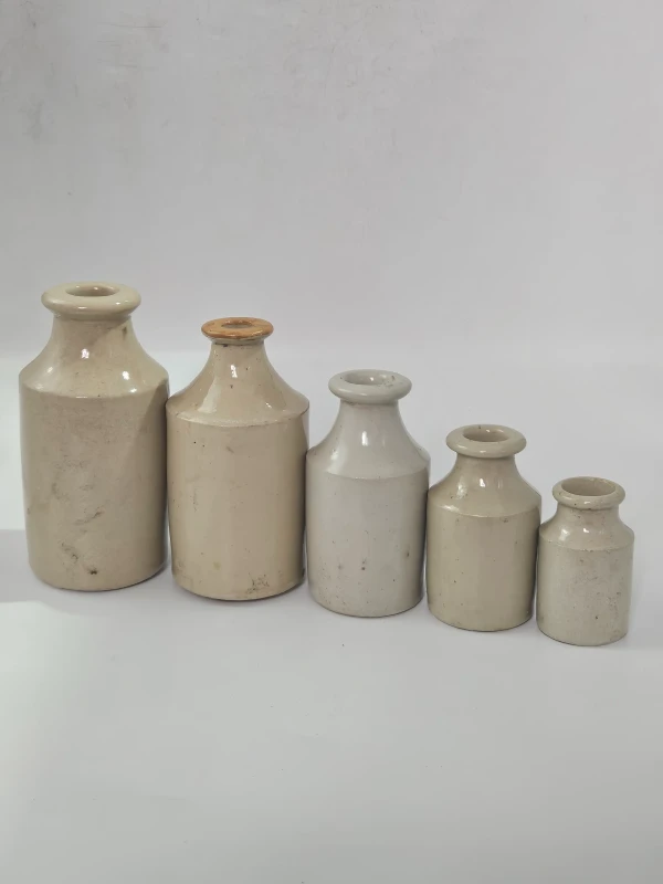 SET OF 5 STONEWARE BOTTLES