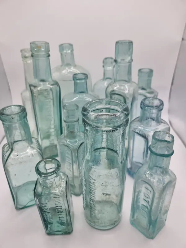 13 Embossed Aqua Bottles