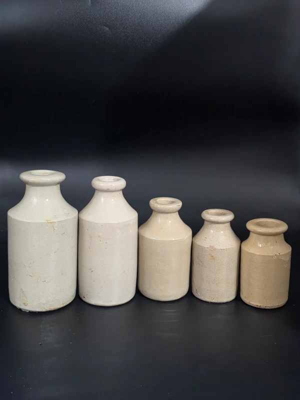 SET OF 5 STONEWARE BOTTLES