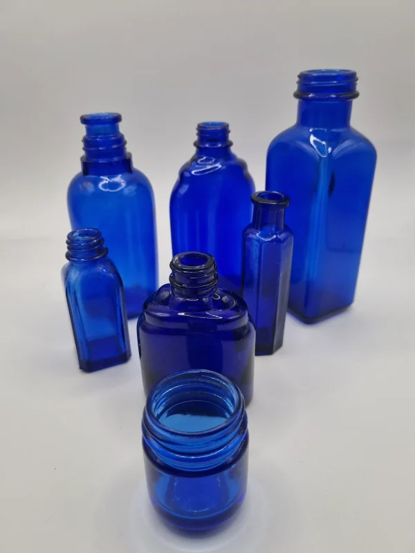 7 Blue Vintage Bottles