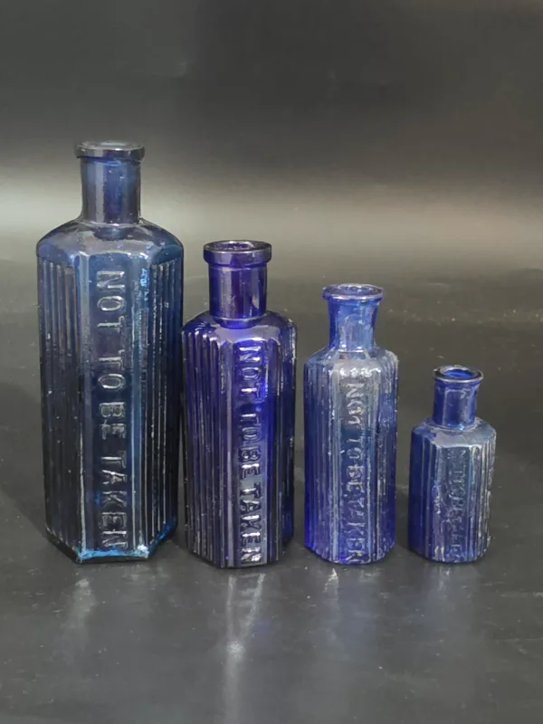 SET OF 4 BLUE POISON BOTTLES