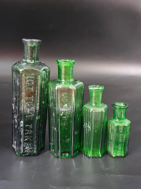 SET OF 4 GREEN POISON BOTTLES