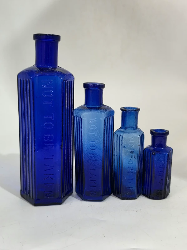 SET OF 4 BLUE POISON BOTTLES