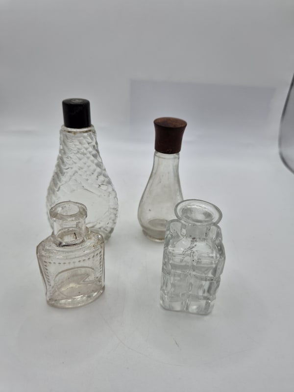 4 Perfume Bottles
