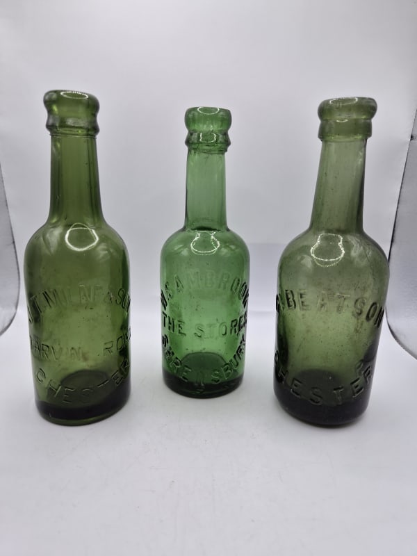 3 Embossed Old English Beer Bottles