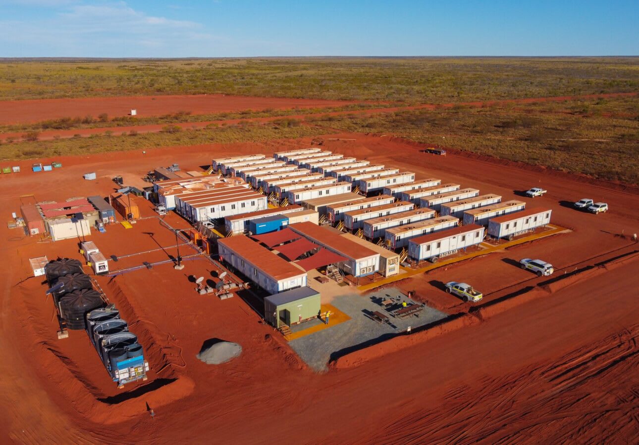 Aerial view of a remote mining camp layout