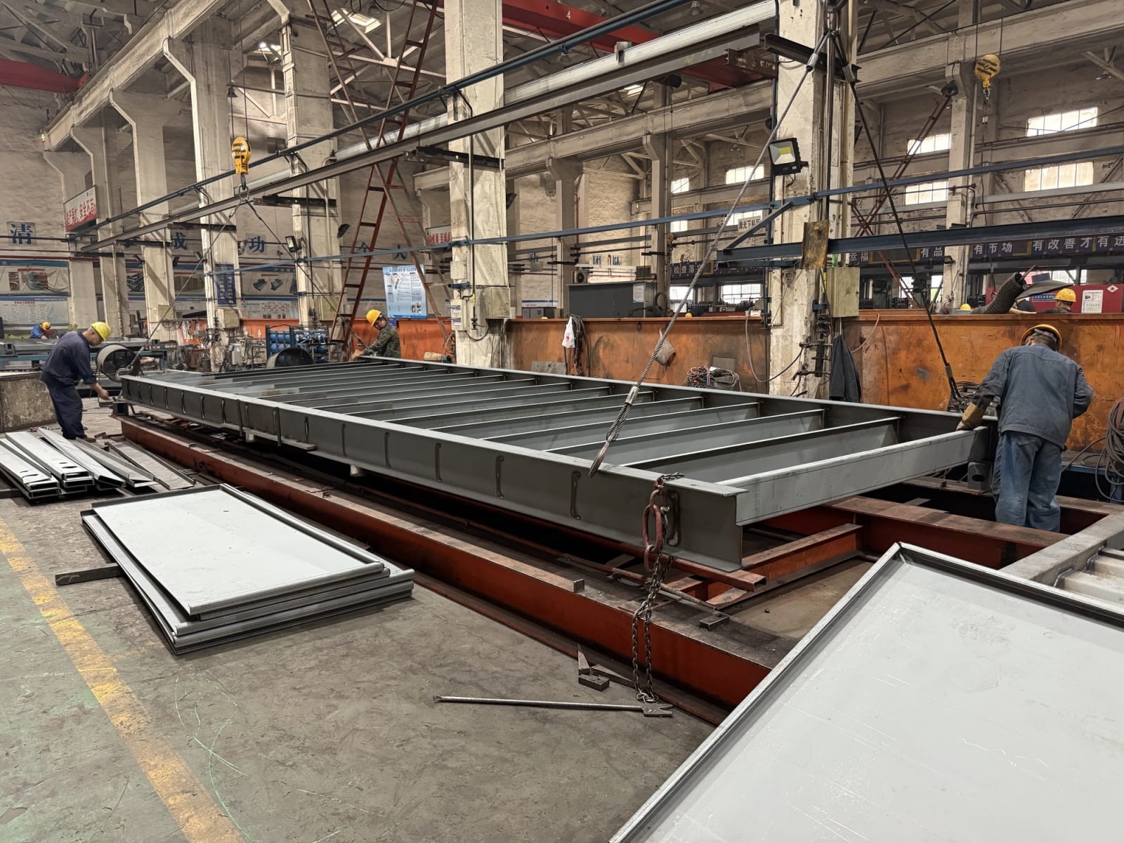 SCS Global Yixing facility production bay, containers on the assembly line.