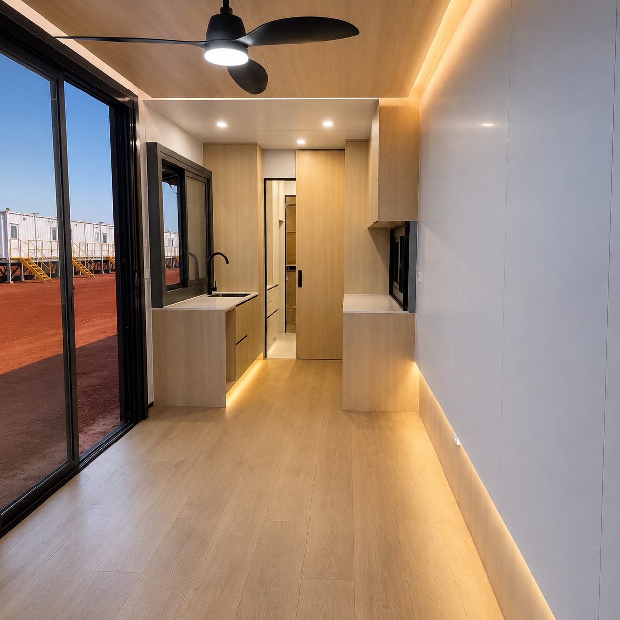 Interior of a single-person mining housing room with ensuite, fitted out at the SCS factory.