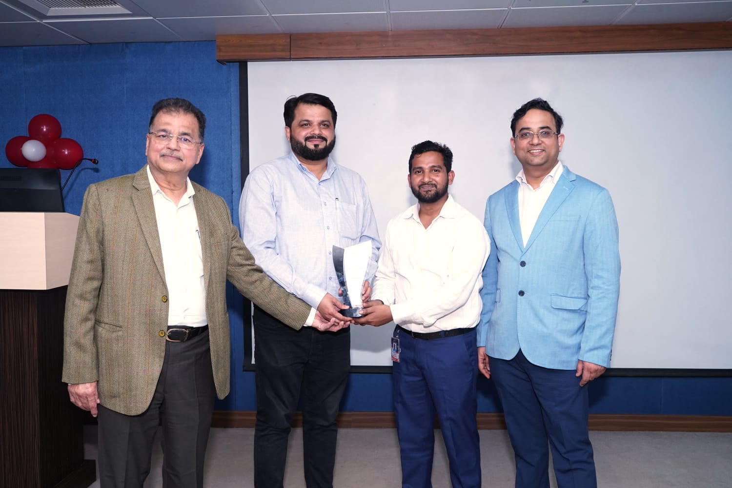 Participant receiving an award at the workshop