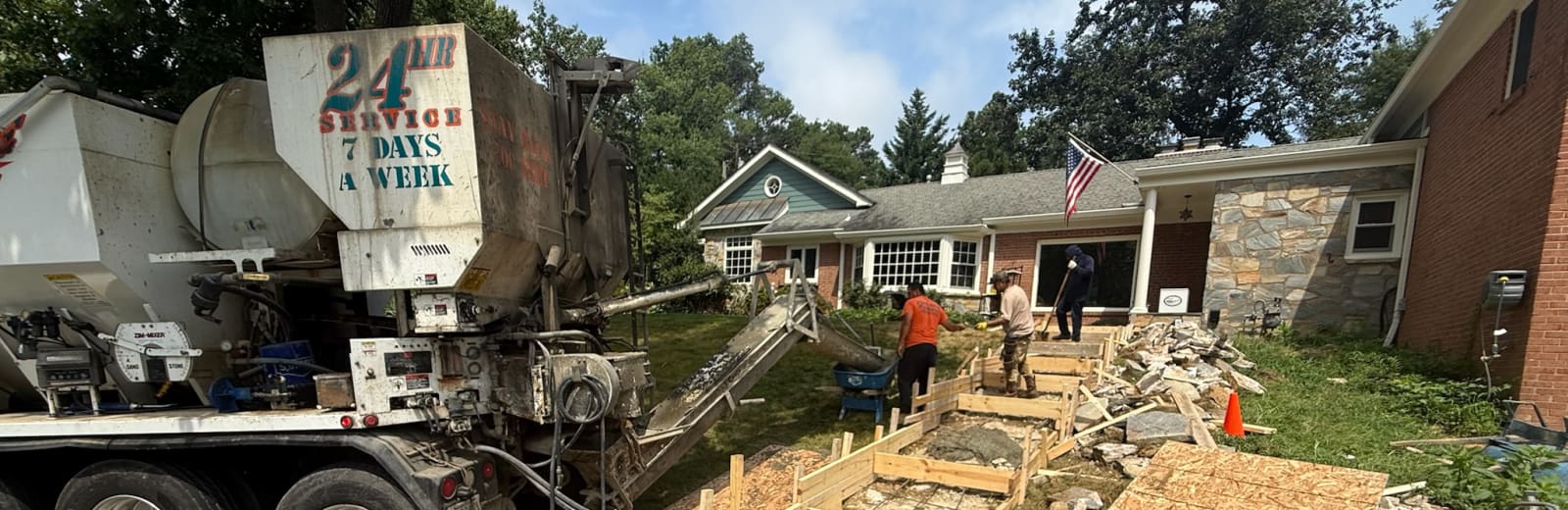 A Forging Solutions crew forming and pouring a new concrete walkway