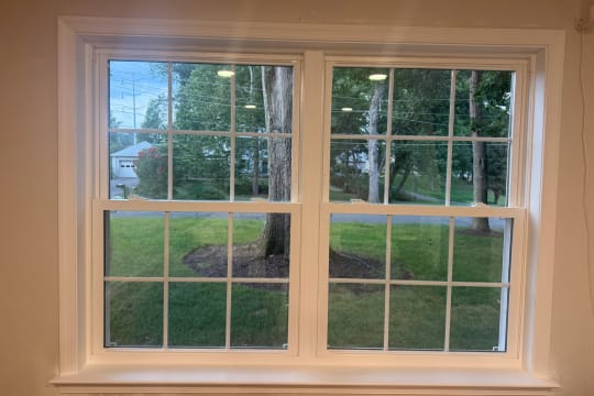 A finished interior renovation with new windows and trim
