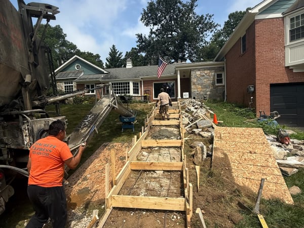 Pouring concrete for a new front walkway