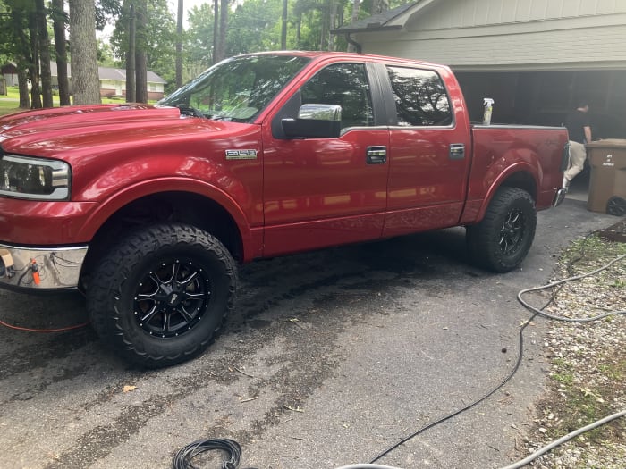 The finished F-150 — clean, glossy paint and dressed tires