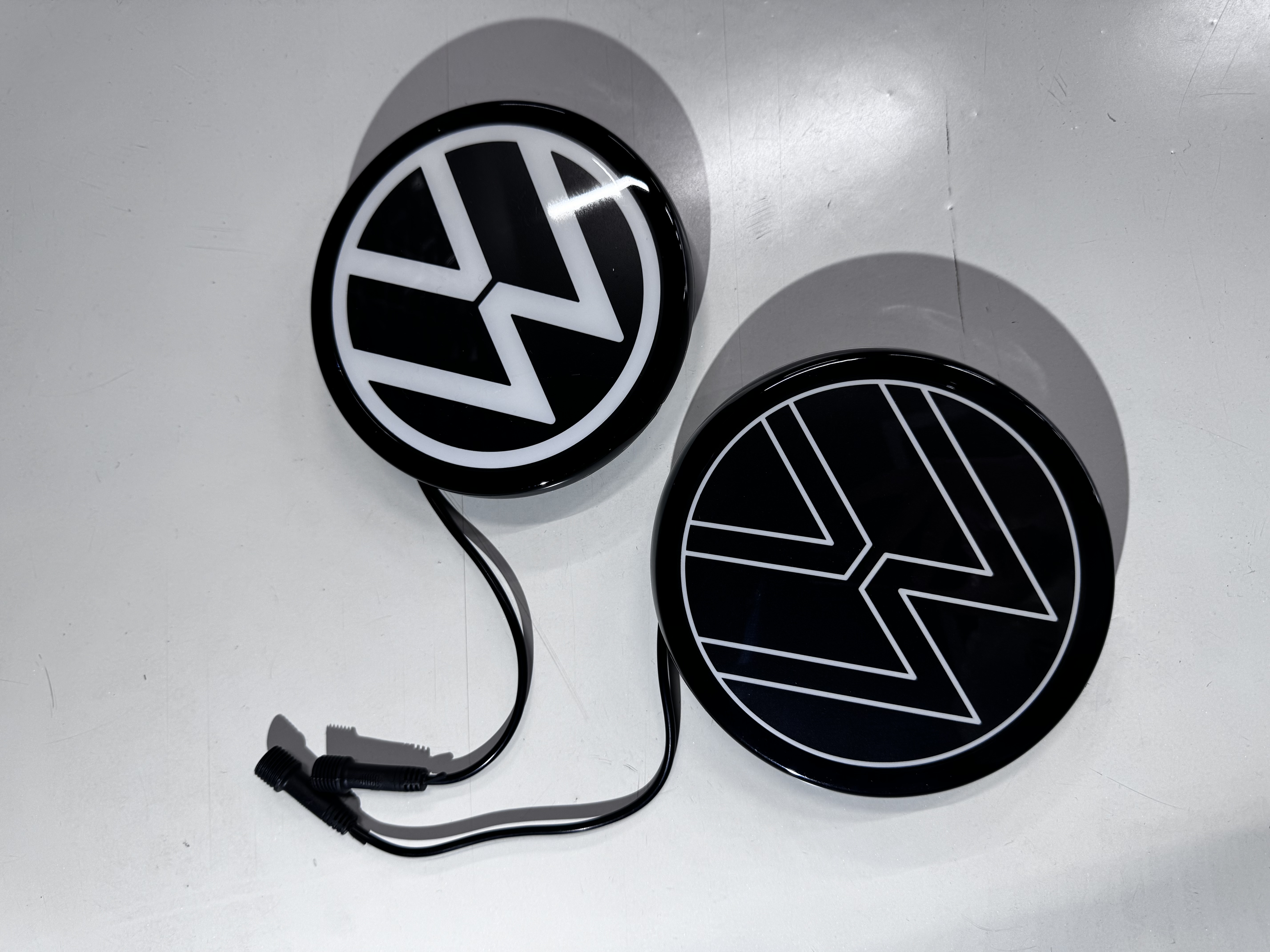 VW LED Emblem — white and black variants