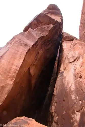 Two rocks leaning against one another to make a sort of arch in Devils Garden, Arches National Park, Utah