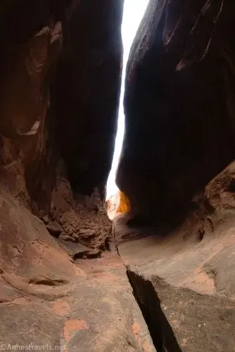 The cave behind Hidden Arch in Devils Garden, Arches National Park, Utah