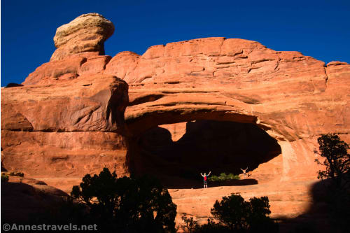 Two hikers in Tower Arch, Arches National Park, Utah