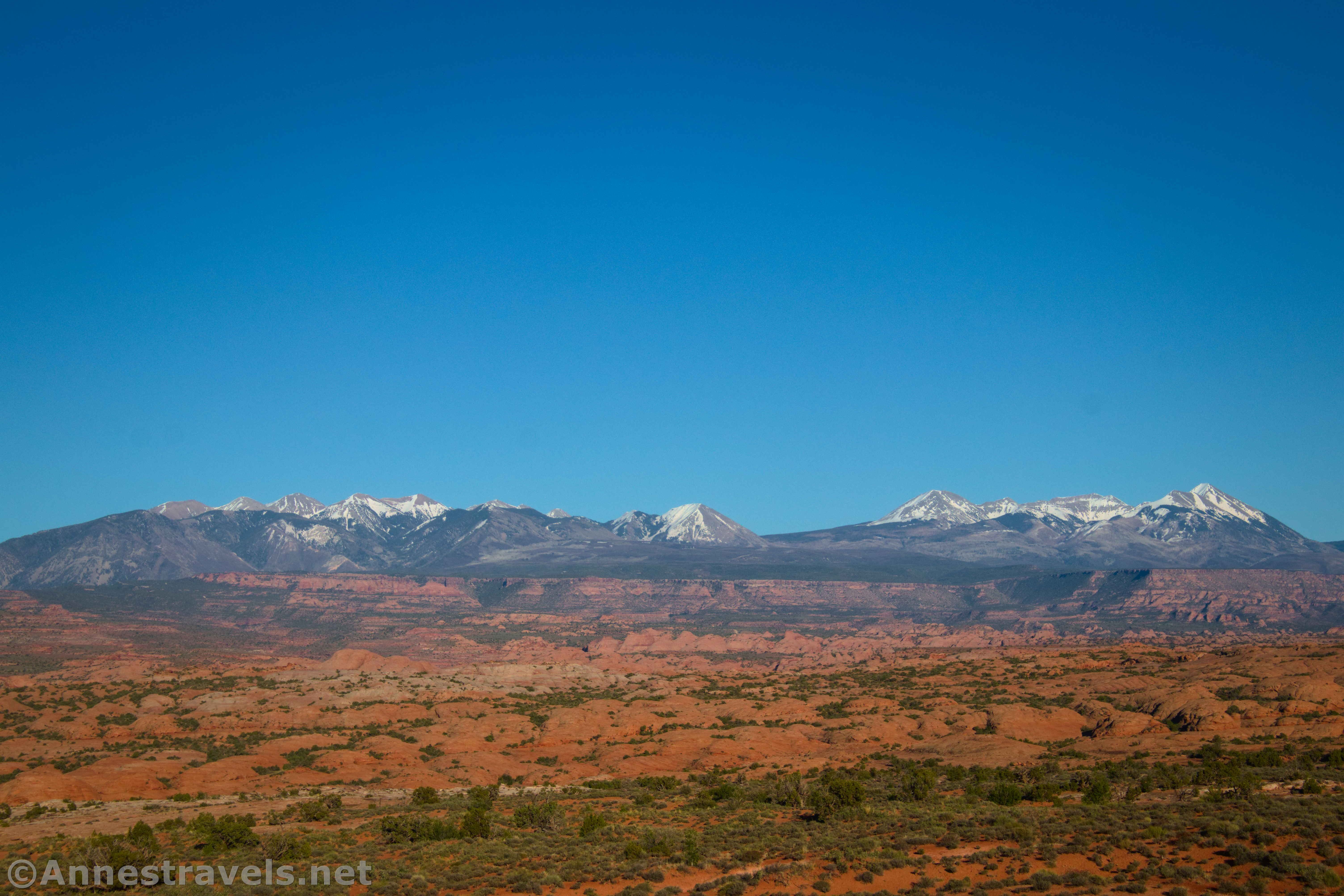 The spring snow on the peaks from the La Sal Mountains Viewpoint, Arches National Park, Utah