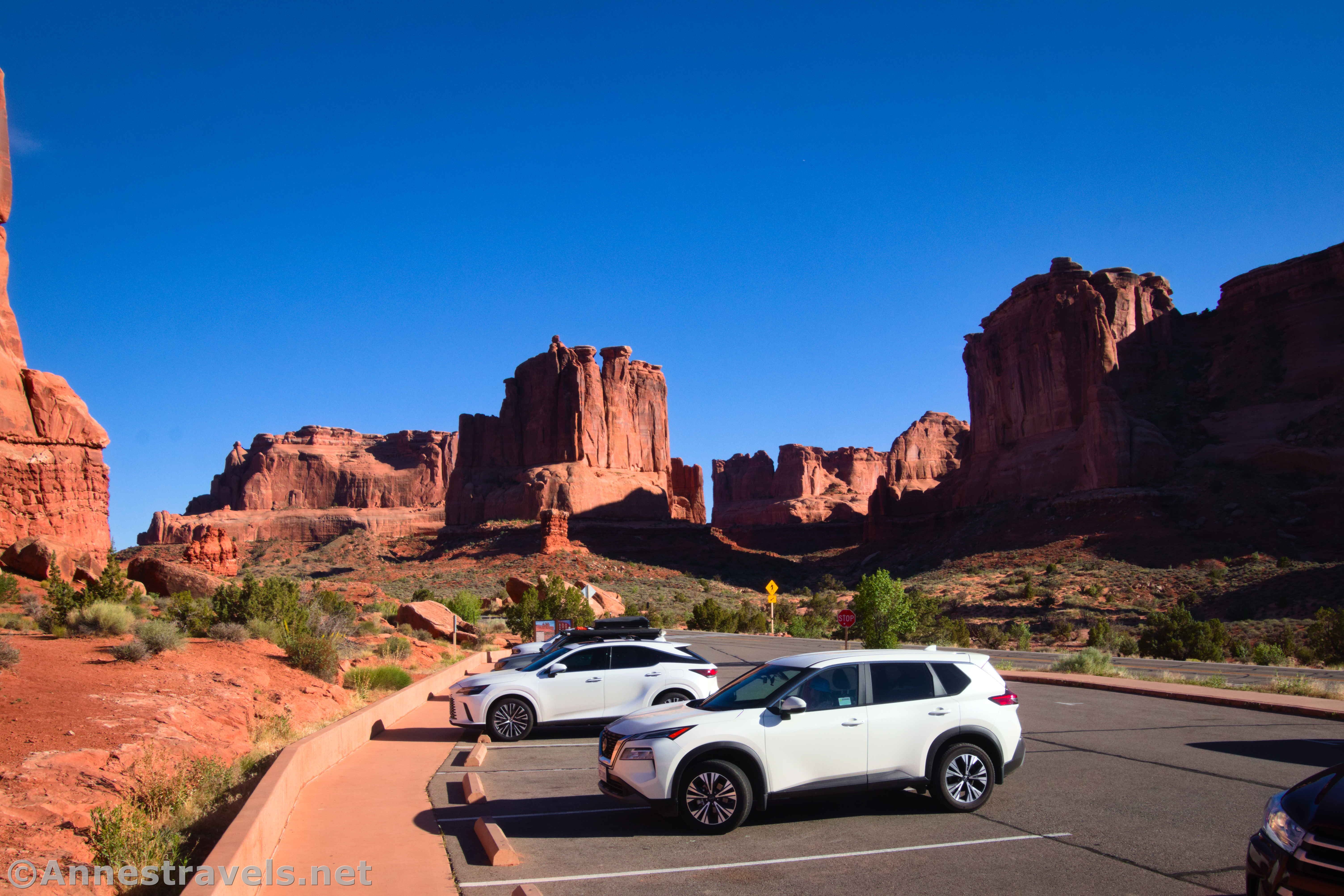 Vehicles at the Courthouse Towers Viewpoint, Arches National Park, Utah