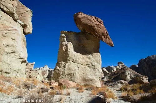 A balancing rock that freaked me out to walk underneath it.  This was in the exploration part of Resurrection Canyon.  Glen Canyon National Recreation Area, Utah