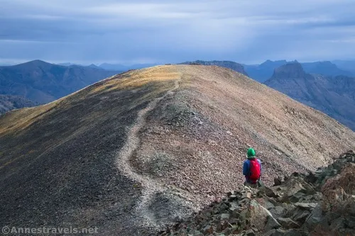 Hiking down into the saddle and then up to Avalanche Peak, Yellowstone National Park, Wyoming