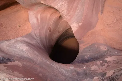 A swirly pothole in Willow Springs Canyon, Arches National Park, Utah