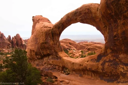 The back of Double O Arch in Devils Garden, Arches National Park, Utah