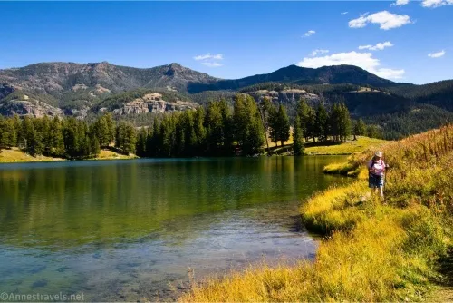 A hiker on the western side of Trout Lake, Yellowstone National Park, Wyoming