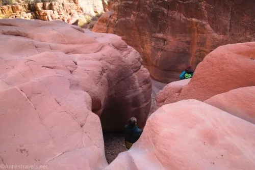 Standing at the top of the bigger dryfall and looking down into Cove Canyon, Maze District of Canyonlands National Park, Utah