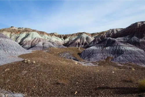 Red gravel and purple-striped badlands