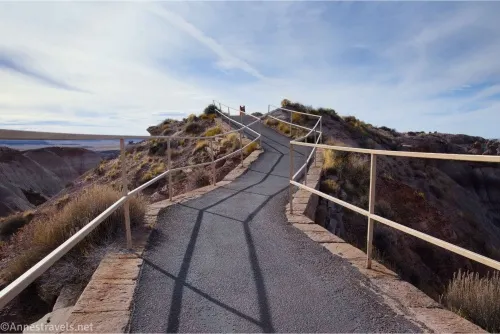 Railings on either side of a paved path