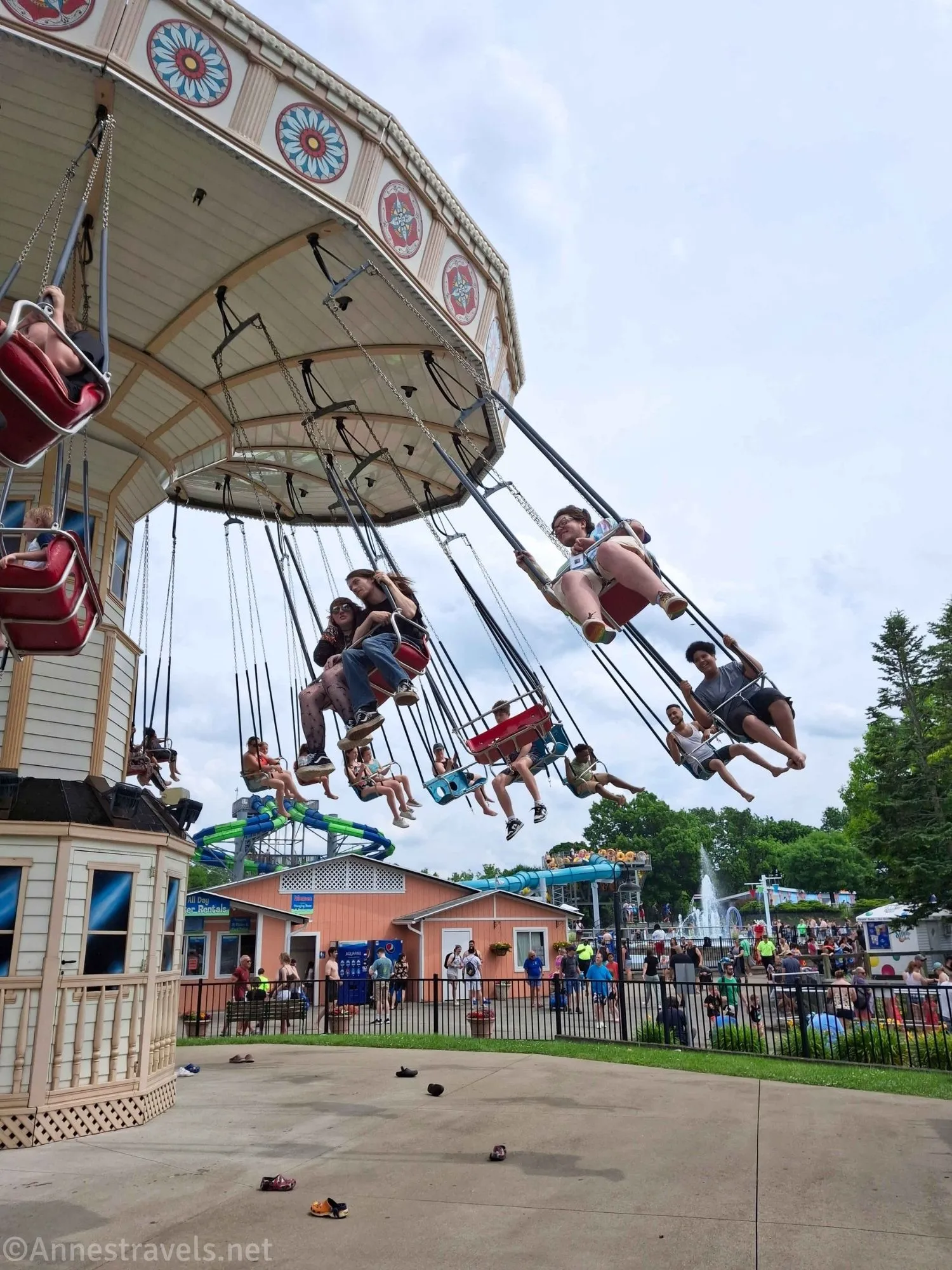The Wave Swinger (with some of the waterslides in the background) at SeaBreeze Amusement Park, New York