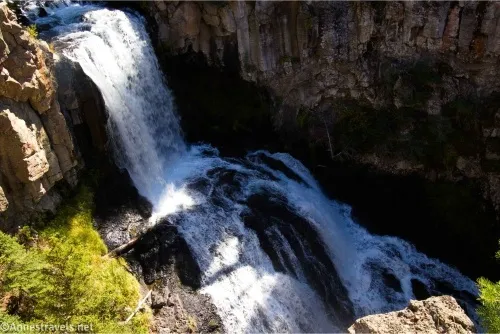 A waterfall tumbles in several steps