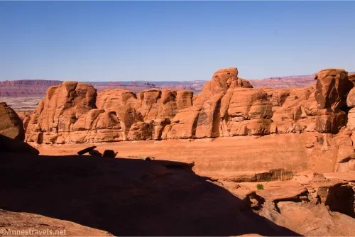 A red cliff of rock formations
