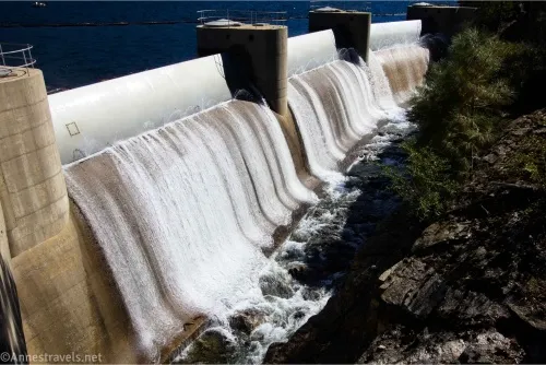 Water cascades from a hydroelectric dam
