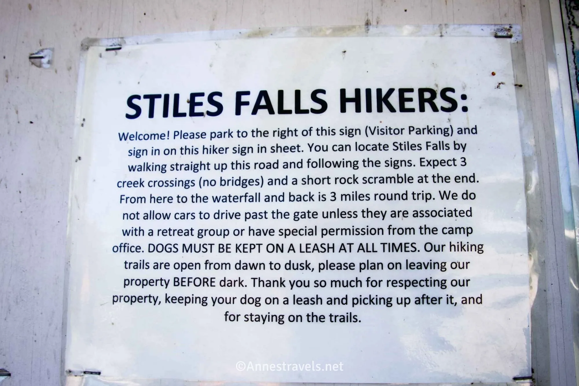 Black text on a white paper says Stiles Falls Hikers and explains the rules and route for the falls
