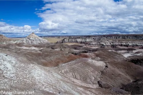 Many badlands with clouds in the sky