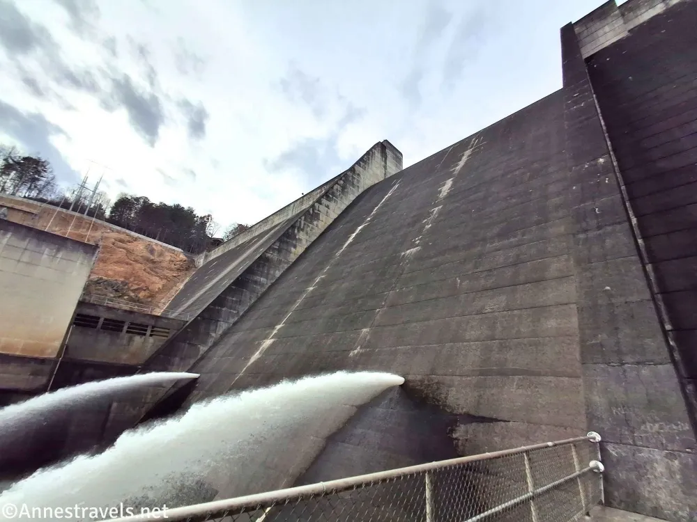 A concrete dam with two jets of water