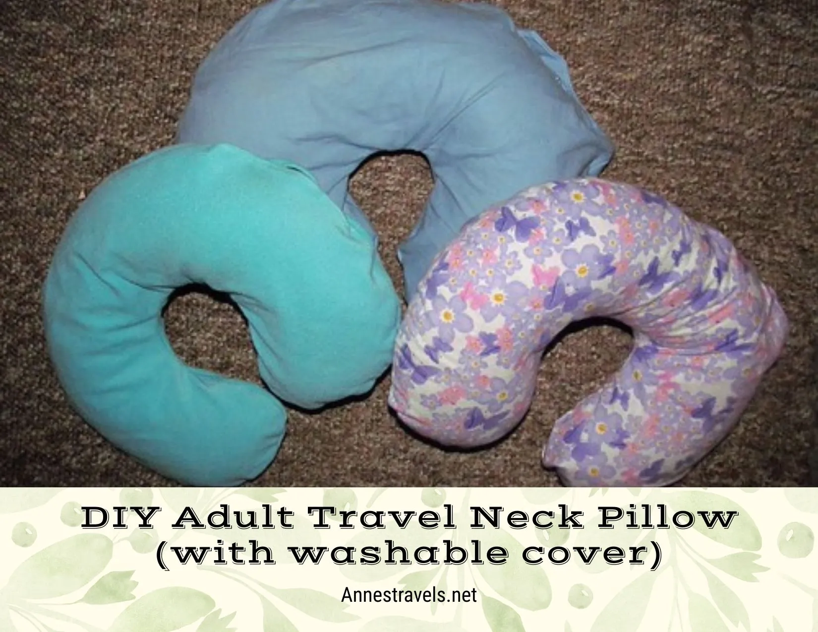 Three neck pillows in turquoise, blue, and purple and pink flowers and butterflies