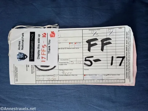 A permit for the fiery furnace including black and red lettering and the national park emblem