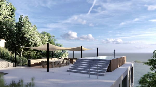 Terraço com piscina de borda infinita e vista mar