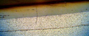 Delamination running parallel with the electrodes