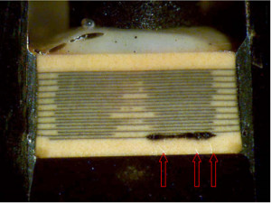 Cracks in the capacitor near failure site