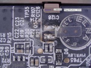 This onboard battery corroded not only the electrical components but also left a residue on the board, which aided in the leakage path and caused the batteries, when the camera did work, to last two weeks.