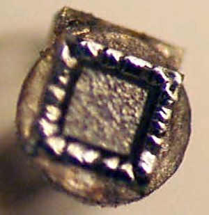 Zener chip with burn mark in middle