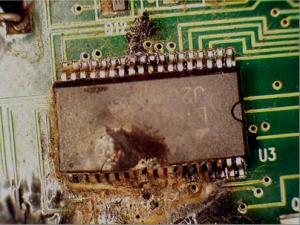 Burned integrated circuit on printed circuit board