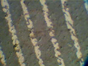 Cracks across adjacent plates