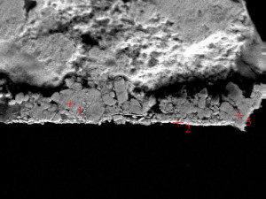 micrograph of right corner of solder bump