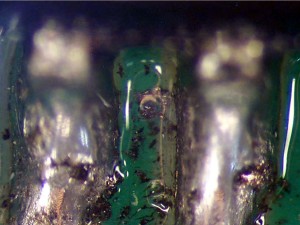 Residual fluxes and dross under conformal coating